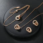 Titanium-Steel-Double-Ring-Roman-Digital-Zircon-Pendant-Necklace-Earrings-Bracelet-Jewelry-Set.webp