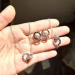 Titanium-Steel-Double-Ring-Roman-Digital-Zircon-Pendant-Necklace-Earrings-Bracelet-Jewelry-Set.webp